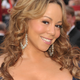 Songstress Mariah Carey is "embarrassed" by Qaddafi ties.